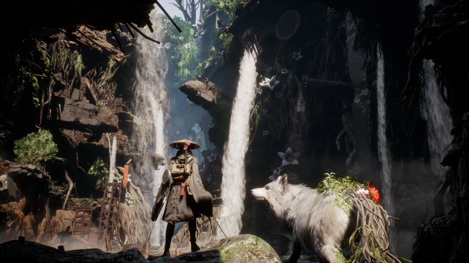 Emma and Koo pause beside waterfalls during exploration